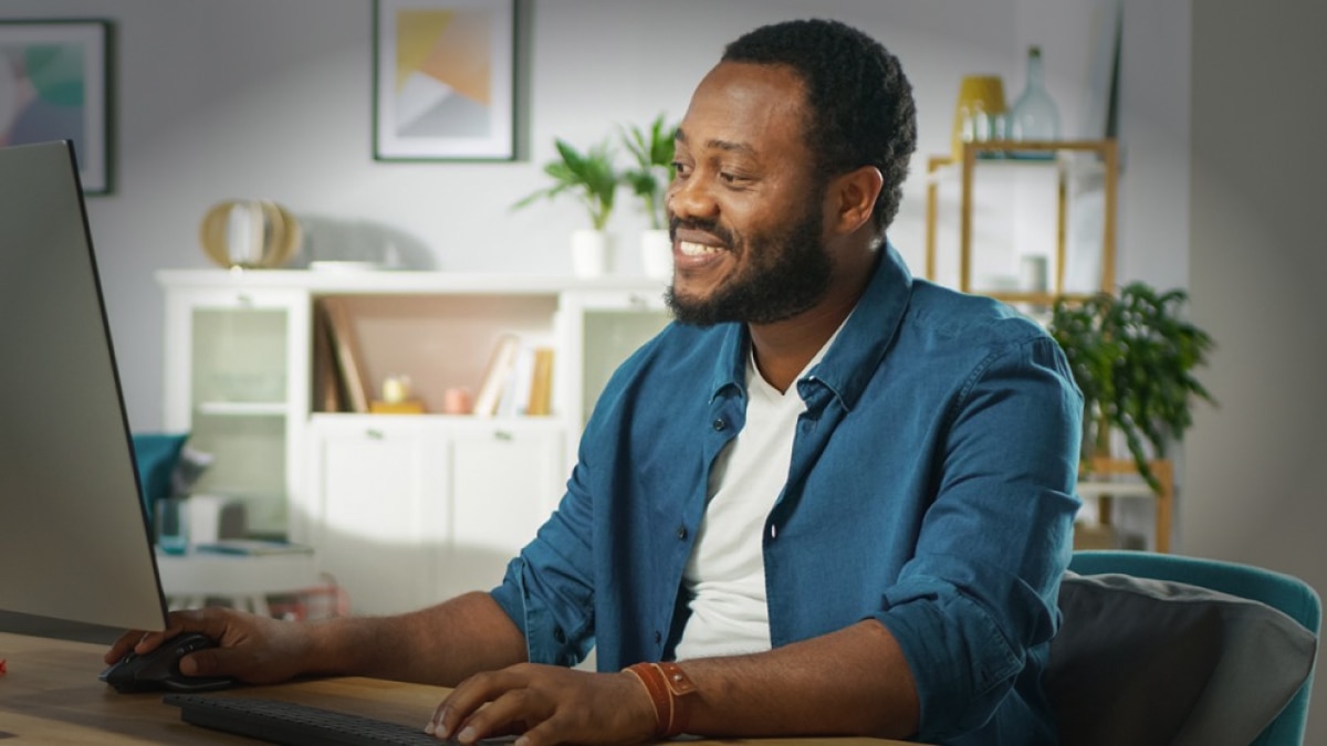 man looking at computer screen