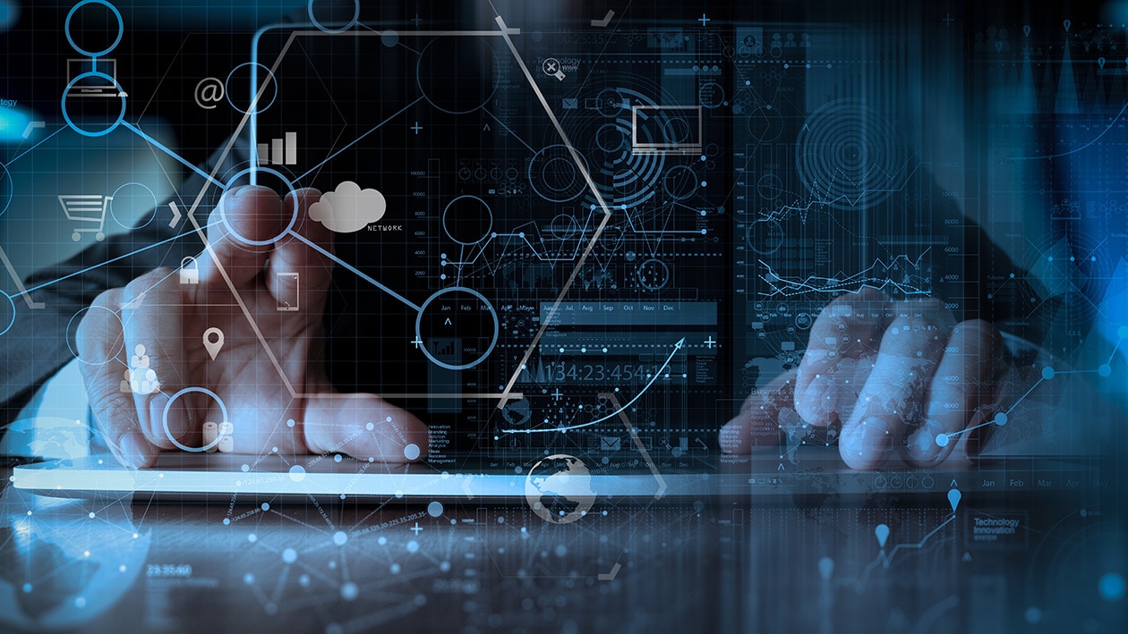 Businessman working with modern laptop computer in modern office with virtual icon diagram Businessman working with modern laptop computer in modern office with virtual icon diagram